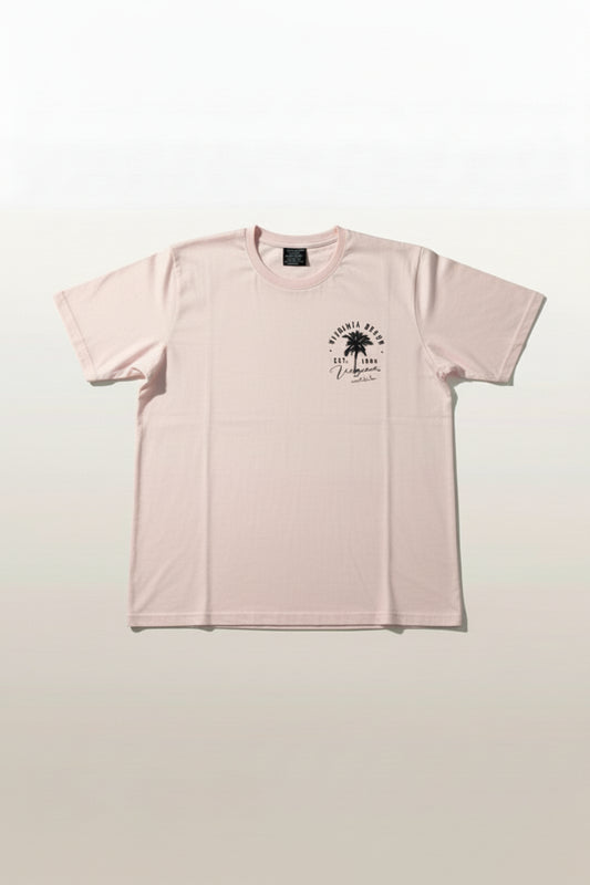 Pink t-shirt with a graphic design on a light gray background