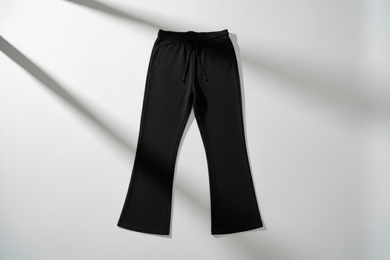 Black sweatpants on a light gray background