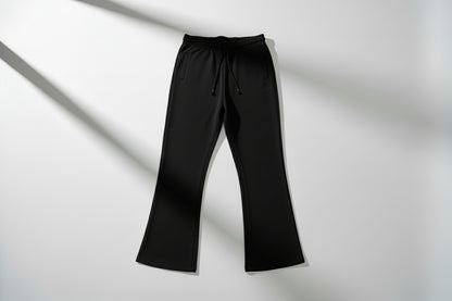 Black sweatpants on a light gray background