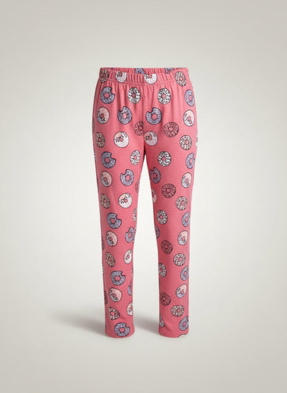 Pink pajama pants with donut pattern on a light gray background