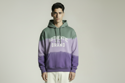 Person wearing a gradient hoodie with 'Authentic Brand' text on a plain background