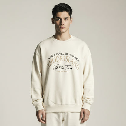 Man wearing a cream-colored sweatshirt and pants with text on a white background