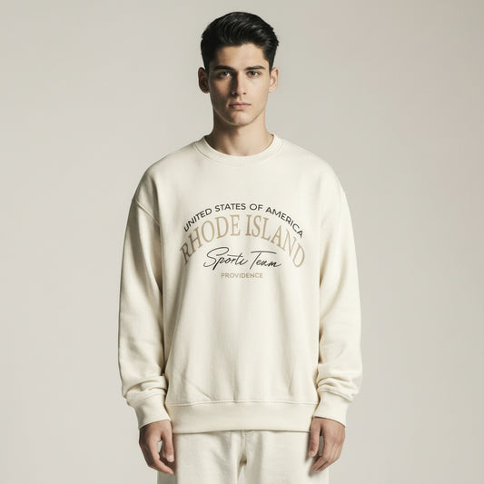Man wearing a cream-colored sweatshirt and pants with text on a white background